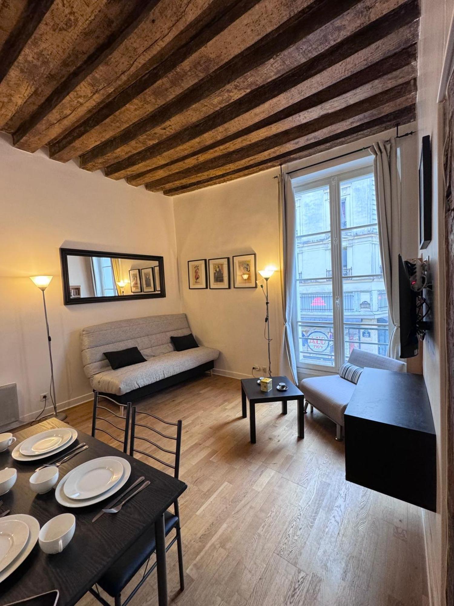 Appartement Typique Parisien Au Coeur Du Marais Buitenkant foto